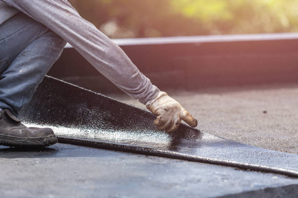 Professional Waterproofing technician working in Woodstock, OH